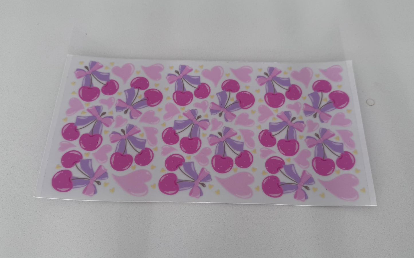 Pink cherries and purple bows