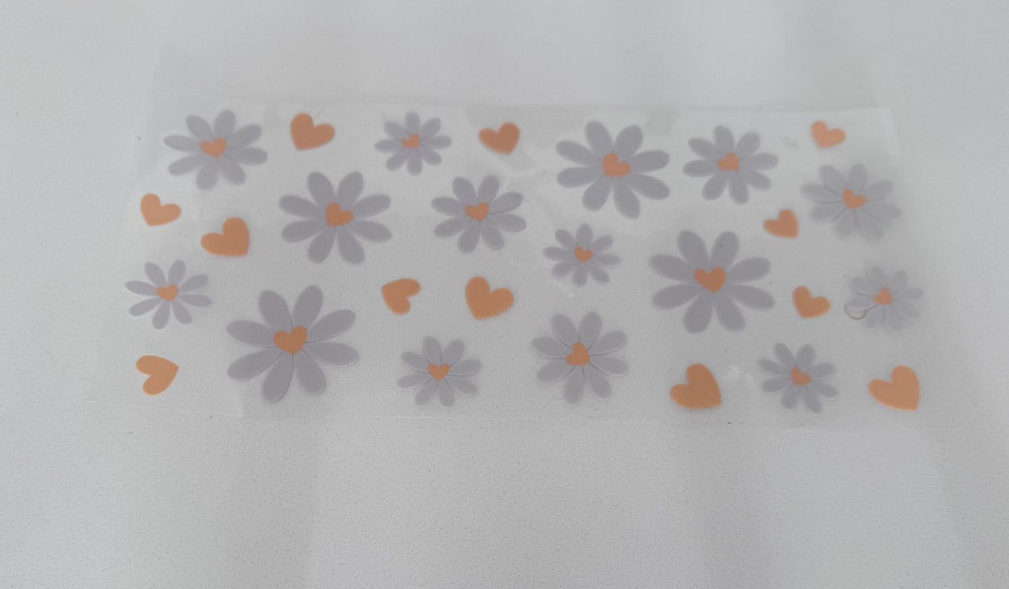 Daisy and yellow hearts